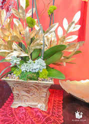 Wisdom Orchid Arrangement in a Brown Pot